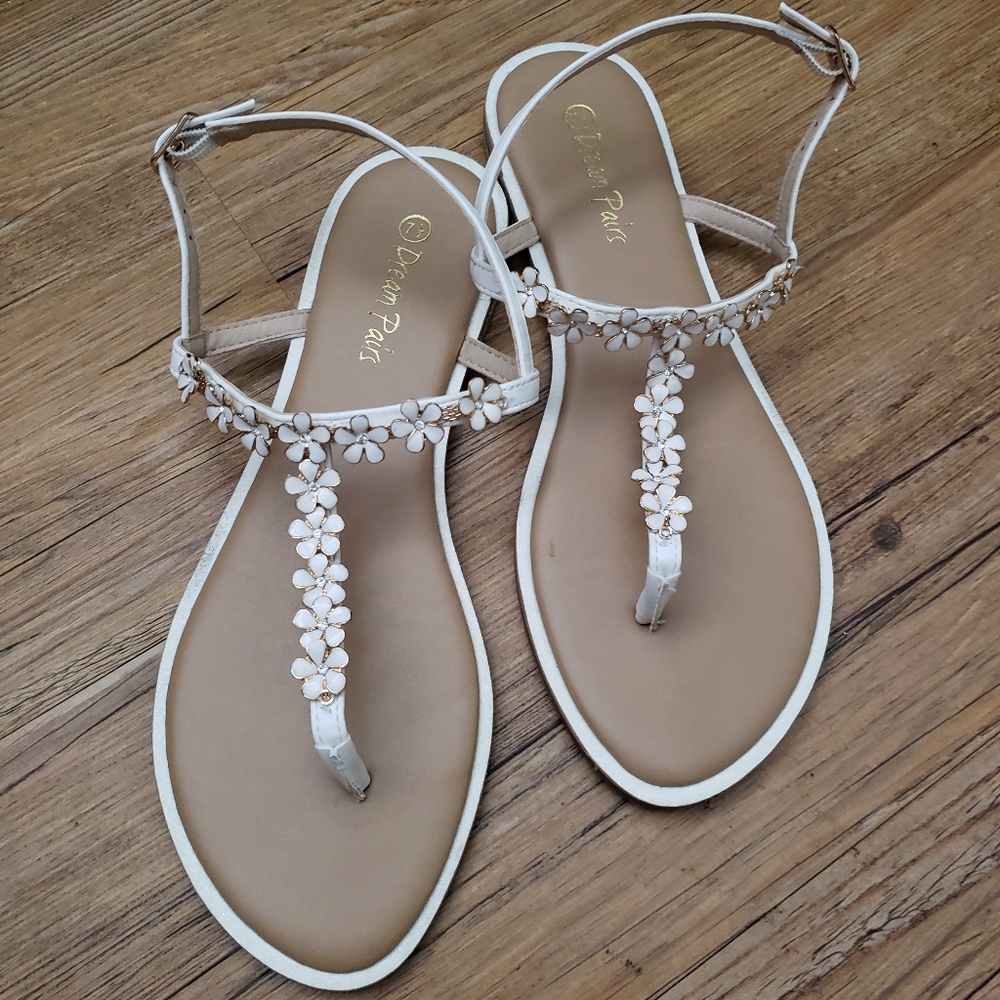 Ivory/white floral rhinestone sandals.